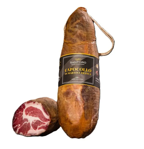 Capocollo di Martina Franca, whole piece with a slice
